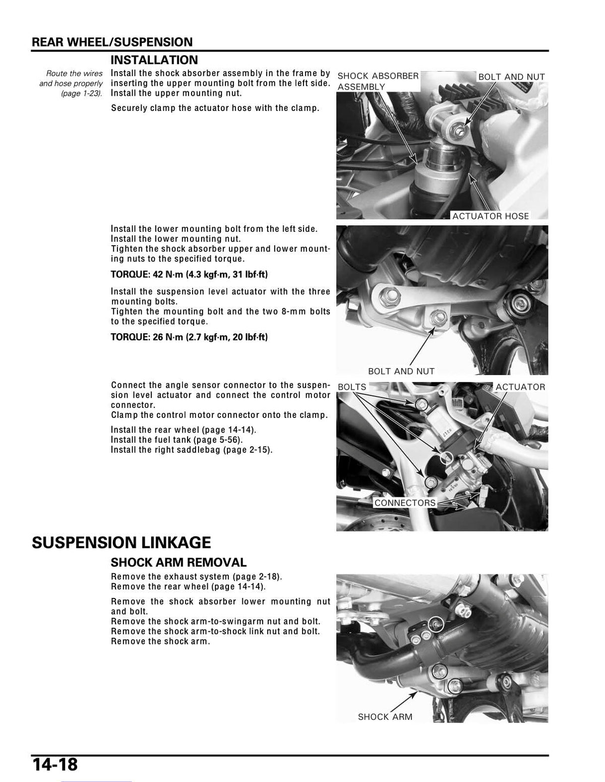 Honda Goldwing service manual page with rear shock absorber mounting and suspension linkage shock arm photos