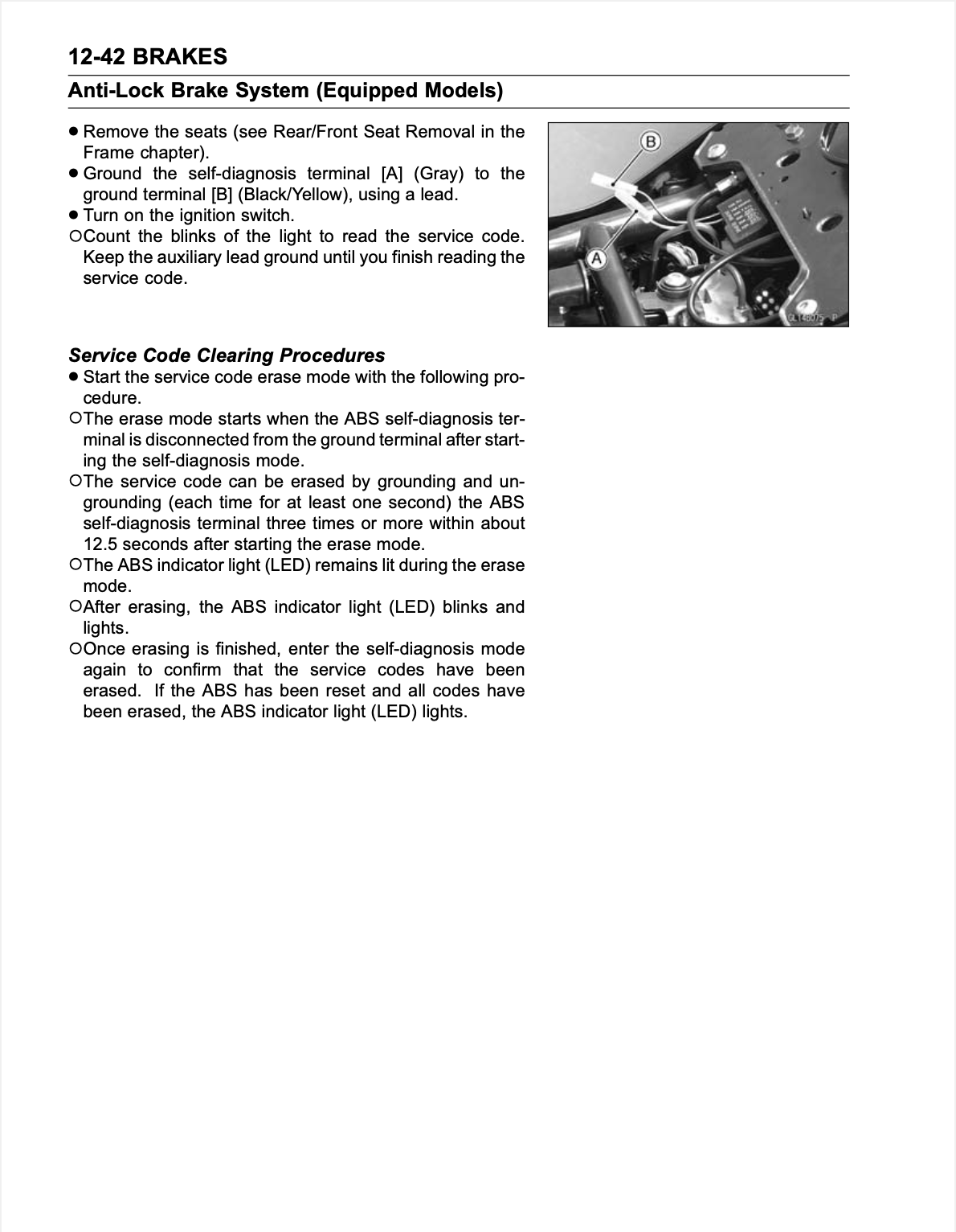 A black and white technical service manual page titled '12-42 BRAKES Anti-Lock Brake System (Equipped Models)' with bullet points and a small inset diagram showing seat removal and ABS terminal connections.