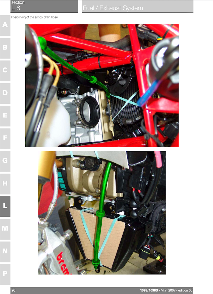 A technical instruction sheet showing two close-up photos of a motorcycle engine with a green hose being routed and secured. The page has a white background with a left-side column labeled A through P, a section header reading 'Section 1 D Fuel / Exhaust System,' and footer text '1000/10085 - M.