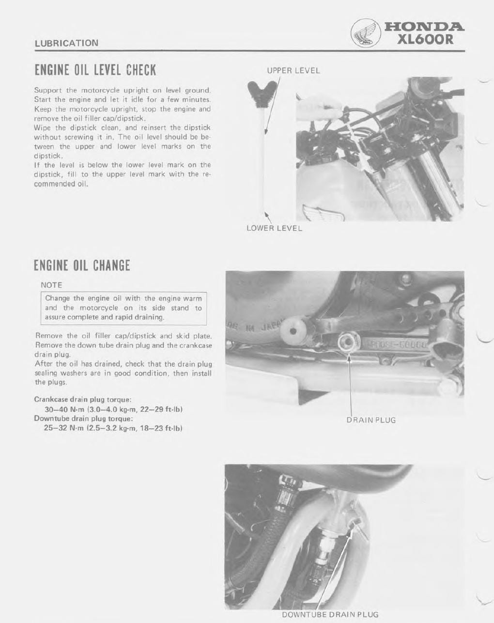 Honda XL600R motorcycle maintenance manual page with oil level check and change instructions.