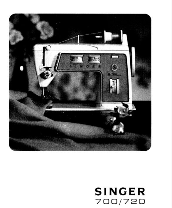 Black and white image of a Singer sewing machine with a blurred background